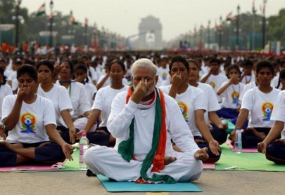 modi performs yoga with the masses sets new record