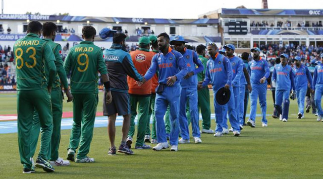 players shake hands at the end of the match photo reuters players shake hands at the end of the match photo reuters