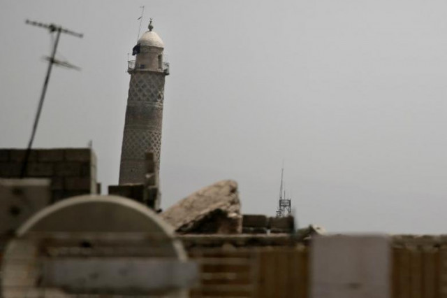 a black militant flag hangs from mosul 039 s al habda minaret at the grand mosque where islamic state leader abu bakr al baghdadi declared his caliphate back in 2014 in western mosul iraq may 29 2017 photo reuters a black militant flag hangs from mosul 039 s al habda minaret at the grand mosque where islamic state leader abu bakr al baghdadi declared his caliphate back in 2014 in western mosul iraq may 29 2017 photo reuters