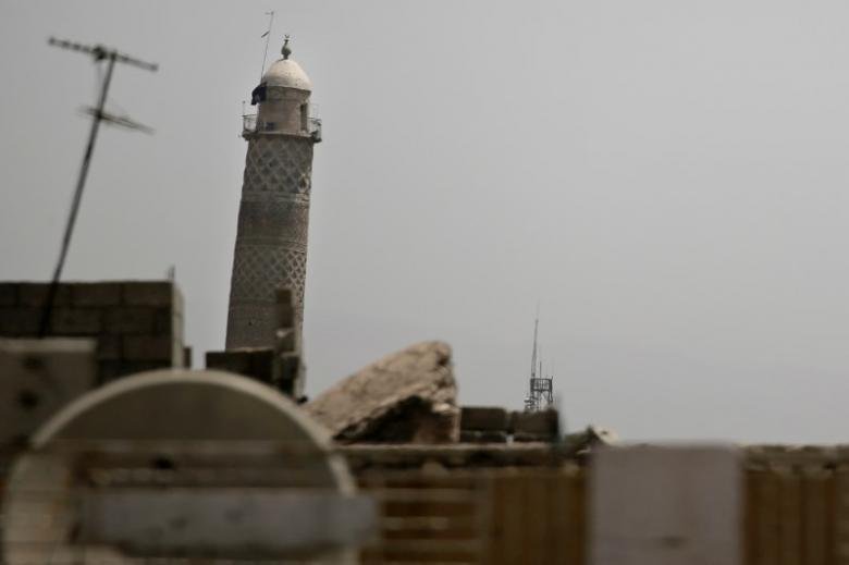 a black militant flag hangs from mosul 039 s al habda minaret at the grand mosque where islamic state leader abu bakr al baghdadi declared his caliphate back in 2014 in western mosul iraq may 29 2017 photo reuters