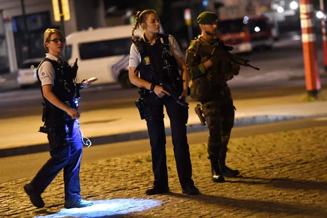 police officials and a soldier stand alert on a street outside gare centrale in brussels on june 20 2017 after an explosion in the belgian capital an explosion rocked the central train station in brussels and a man was shot by security as scenes of terror returned to the european capital a suspect shouted out quot allahu akbar quot god is greatest before causing the blast a witness said belgium 039 s national crisis centre said the suspect had been quot neutralised quot and the situation was under control photo afp police officials and a soldier stand alert on a street outside gare centrale in brussels on june 20 2017 after an explosion in the belgian capital an explosion rocked the central train station in brussels and a man was shot by security as scenes of terror returned to the european capital a suspect shouted out quot allahu akbar quot god is greatest before causing the blast a witness said belgium 039 s national crisis centre said the suspect had been quot neutralised quot and the situation was under control photo afp