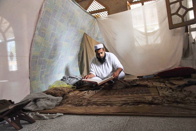 a worshipper observes aitekaf during the holy month of ramazan photo afp file