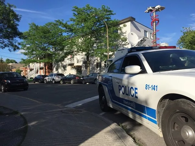 montreal police guard the front of the four storey building rear in montreal on june 21 2017 where amor ftouhi who is suspected of stabbing a michigan airport police officer lived before traveling to the us earlier this month photo afp montreal police guard the front of the four storey building rear in montreal on june 21 2017 where amor ftouhi who is suspected of stabbing a michigan airport police officer lived before traveling to the us earlier this month photo afp
