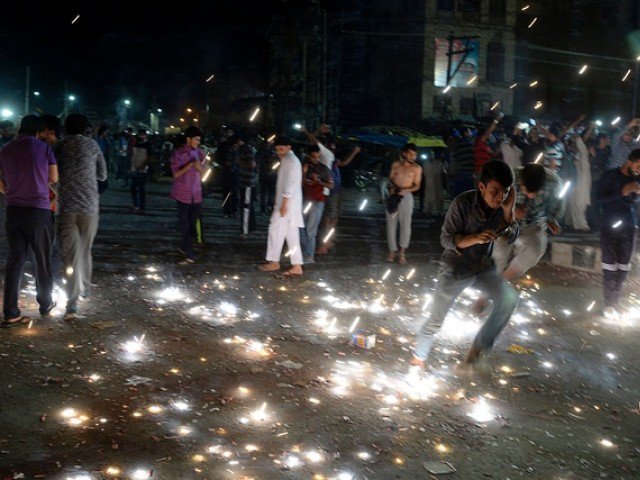 kashmirisplay with fireworks as they celebrate after pakistan won the champions trophy in srinagar photo afp