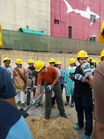 students of nixor college are participating in a training exercise for school construction in their school 039 s parking lot photo express students of nixor college are participating in a training exercise for school construction in their school 039 s parking lot photo express