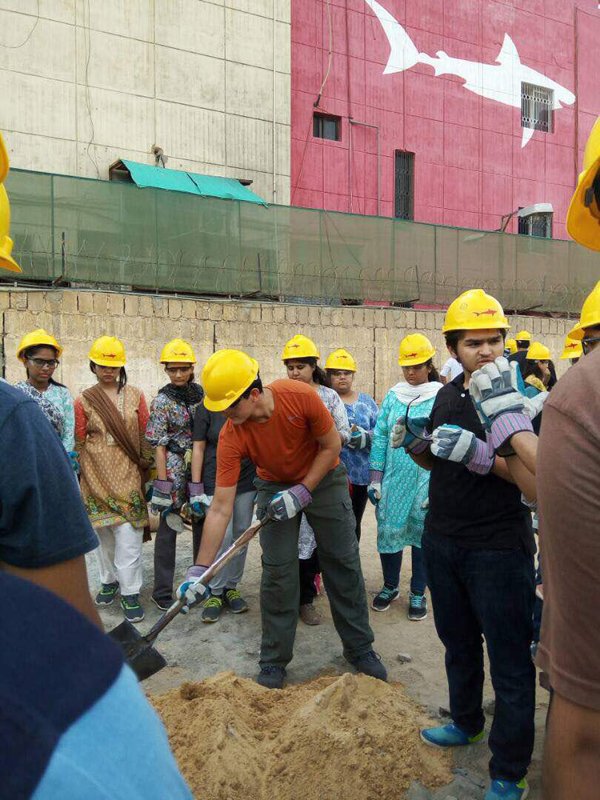 students of nixor college are participating in a training exercise for school construction in their school 039 s parking lot photo express