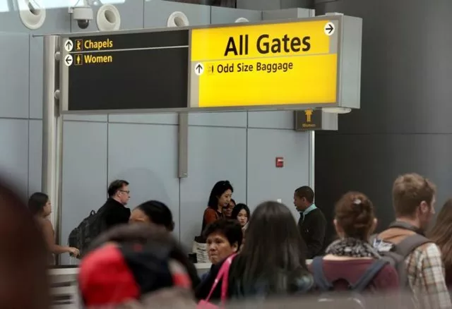 passengers queue to go through security at terminal 4 of jfk airport in new york photo file passengers queue to go through security at terminal 4 of jfk airport in new york photo file