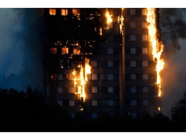 flames and smoke billow as firefighters deal with a serious fire in a tower block at latimer road in west london britain june 14 2017 photo reuters