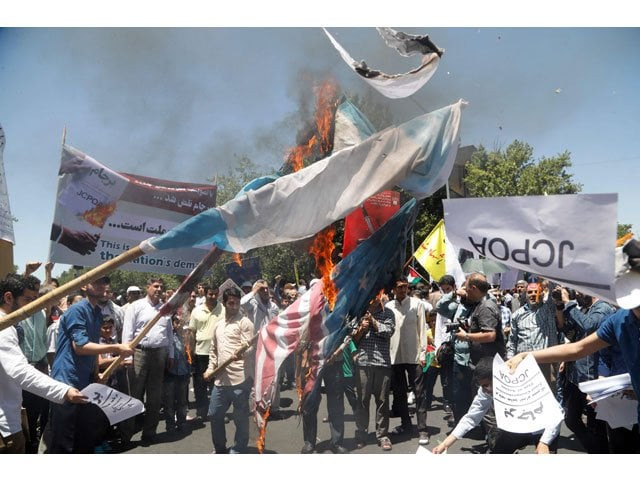 iranians burn a us flag during a rally marking qods day jerusalem day in support of palestinian resistance against israeli occupation in tehran iran on june 23 2016 photo afp iranians burn a us flag during a rally marking qods day jerusalem day in support of palestinian resistance against israeli occupation in tehran iran on june 23 2016 photo afp