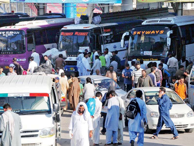 people board buses to go home for eid photo express