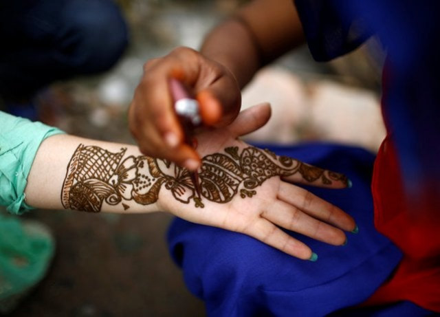 a palm of a woman is decorated with mehndi also knows as henna tattoos during the shrawan sombar festival in kathmandu nepal photo reuters a palm of a woman is decorated with mehndi also knows as henna tattoos during the shrawan sombar festival in kathmandu nepal photo reuters