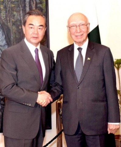 chinese foreign minister wang yi with pm 039 s advisor of foreign affairs sartaj aziz chinese foreign minister wang yi with pm 039 s advisor of foreign affairs sartaj aziz