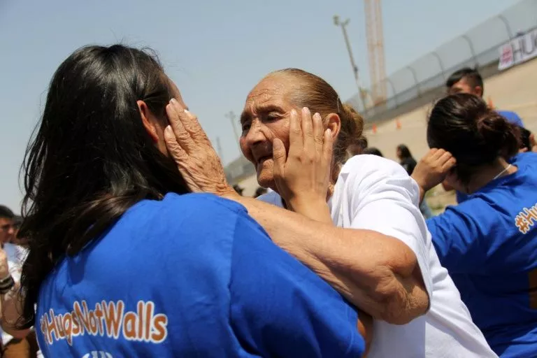 families separated by the us mexico border are reunited for a few minutes in a quot hugs not walls quot event in ciudad juarez mexico on june 24 2017 photo afp families separated by the us mexico border are reunited for a few minutes in a quot hugs not walls quot event in ciudad juarez mexico on june 24 2017 photo afp