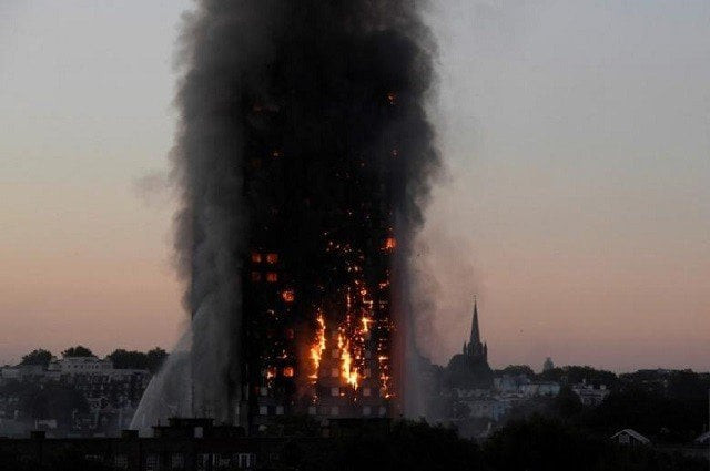 flames and smoke billow as firefighters deal with a serious fire in the grenfell tower apartment block at latimer road in west london photo reuters flames and smoke billow as firefighters deal with a serious fire in the grenfell tower apartment block at latimer road in west london photo reuters