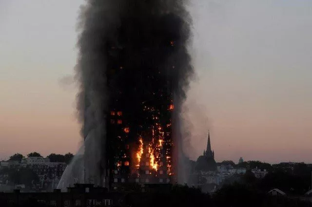 flames and smoke billow as firefighters deal with a serious fire in the grenfell tower apartment block at latimer road in west london photo reuters flames and smoke billow as firefighters deal with a serious fire in the grenfell tower apartment block at latimer road in west london photo reuters