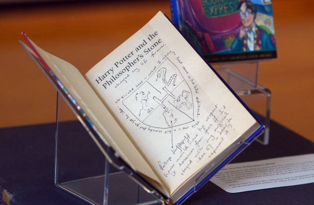 hand written notes by author j k rowling are pictured inside a rare first edition of her book 039 harry potter and the philosopher 039 s stone 039 displayed at the national library of scotland in edinburgh scotland on june 26 2017 photo afp hand written notes by author j k rowling are pictured inside a rare first edition of her book 039 harry potter and the philosopher 039 s stone 039 displayed at the national library of scotland in edinburgh scotland on june 26 2017 photo afp