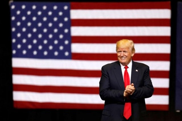 us president donald trump takes the stage for a rally at the u s cellular centre in cedar rapids iowa us photo reuters