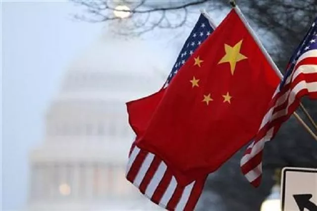 the people 039 s republic of china flag and the u s stars and stripes fly along pennsylvania avenue near the u s capitol in washington during chinese president hu jintao 039 s state visit photo reuters the people 039 s republic of china flag and the u s stars and stripes fly along pennsylvania avenue near the u s capitol in washington during chinese president hu jintao 039 s state visit photo reuters