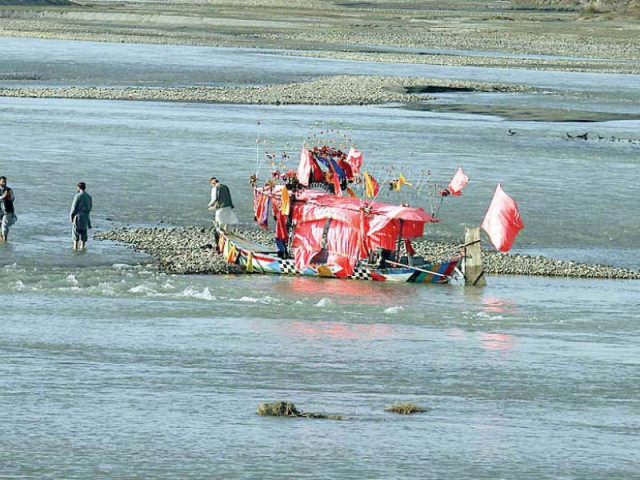 people wet their feet in the cold water of khiayali river photo app people wet their feet in the cold water of khiayali river photo app