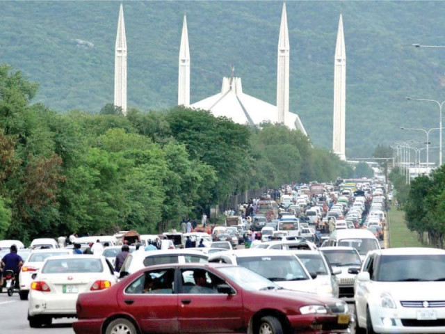 cars are caught in a jam on faisal avenue on wednesday photo inp cars are caught in a jam on faisal avenue on wednesday photo inp