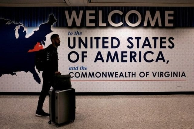 an international passenger arrives at washington dulles international airport after the u s supreme court granted parts of the trump administration 039 s emergency request to put its travel ban into effect later in the week pending further judicial review in dulles virginia us photo reuters an international passenger arrives at washington dulles international airport after the u s supreme court granted parts of the trump administration 039 s emergency request to put its travel ban into effect later in the week pending further judicial review in dulles virginia us photo reuters