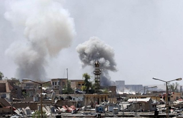 smoke billows from the islamic state militants positions after an artillery attack by iraqi forces photo reuters