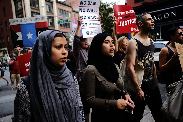 recent immingrants join activists for an evening protest in manhattan hours before a revised version of president donald trump 039 s travel ban that was approved by the supreme court is to take effect on june 29 2017 in new york city hundreds of protesters marched through the streets demanding and end to the ban which prohibits for 90 days the entry of travellers from six predominantly muslim countries iran libya somalia sudan syria and yemen the court granted an exception for people with 039 bona fide relationships 039 in the united states photo afp