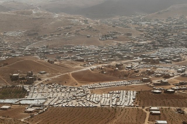 a general view shows syrian refugee camps dotted in and around the lebanese town of arsal near the border with syria lebanon september 21 2016 photo reuters