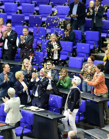 mp s from the green party celebrate with confetti following a debate and vote on same sex marriage in bundestag germany s lower house of parliament in berlin on june 30 2017 a clear majority of german mps voted to legalise same sex marriage days after chancellor angela merkel dropped her opposition to the idea photo afp mp s from the green party celebrate with confetti following a debate and vote on same sex marriage in bundestag germany s lower house of parliament in berlin on june 30 2017 a clear majority of german mps voted to legalise same sex marriage days after chancellor angela merkel dropped her opposition to the idea photo afp