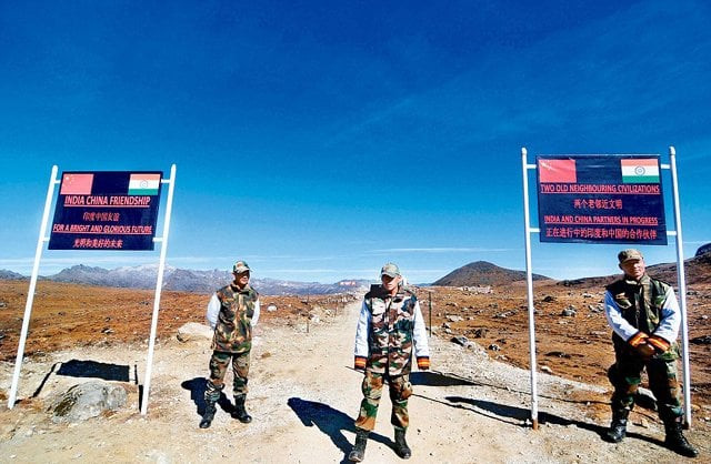 indian army personnel keep vigil at the india china border in arunachal pradesh photo afp indian army personnel keep vigil at the india china border in arunachal pradesh photo afp