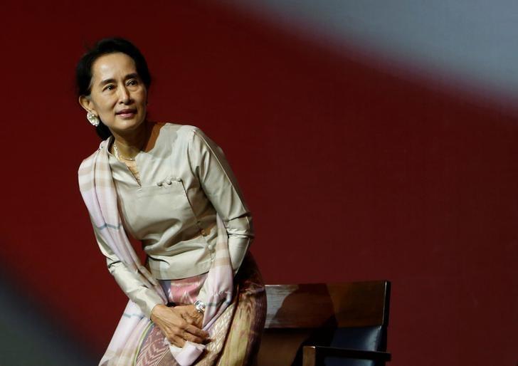 myanmar 039 s opposition leader aung san suu kyi takes her seat as she waits to speak to the myanmar community living in singapore on the island of sentosa in singapore photo reuters