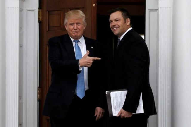u s president donald trump stands with kansas secretary of state kris kobach before their meeting at trump national golf club in bedminster new jersey u s on november 20 2016 photo reuters u s president donald trump stands with kansas secretary of state kris kobach before their meeting at trump national golf club in bedminster new jersey u s on november 20 2016 photo reuters