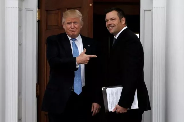 u s president donald trump stands with kansas secretary of state kris kobach before their meeting at trump national golf club in bedminster new jersey u s on november 20 2016 photo reuters u s president donald trump stands with kansas secretary of state kris kobach before their meeting at trump national golf club in bedminster new jersey u s on november 20 2016 photo reuters