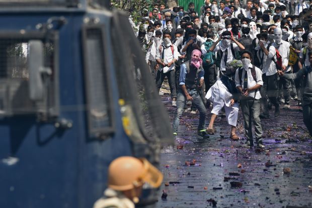 police fired tear gas and dozens of students were injured in the protests in indian occupied kashmir photo afp