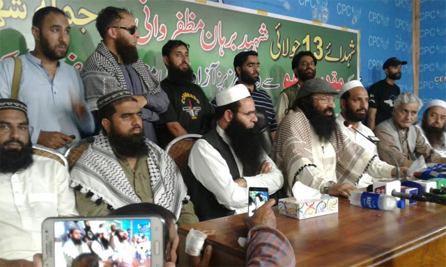 syed salahuddin third from left holding his first press conference after being declared a specially designated global terrorist by the us state department on june 27 photo express