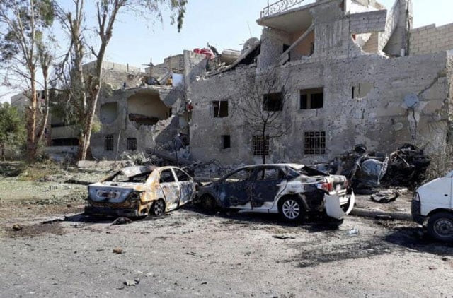 damaged cars are seen at one of the blast sites in damascus in this handout picture posted on sana on july 2 2017 syria photo reuters