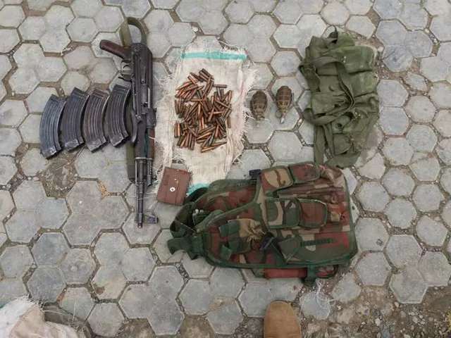 a view of some of the weapons and ammunition seized a view of some of the weapons and ammunition seized