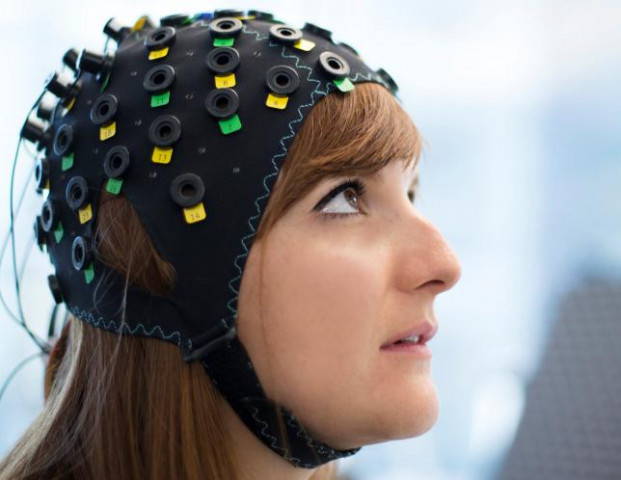 the nirs eeg brain computer interface system is worn by a model in switzerland in this undated photograph released in london britain january 31 2017 photo reuters