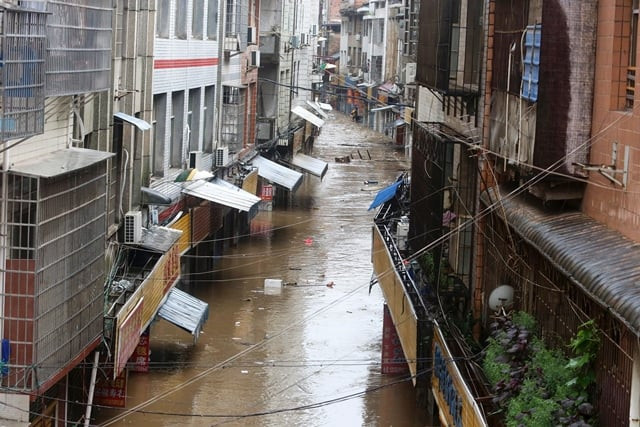 this picture taken on july 2 2017 shows a general view of a flooded street in loudi hunan province photo afp this picture taken on july 2 2017 shows a general view of a flooded street in loudi hunan province photo afp