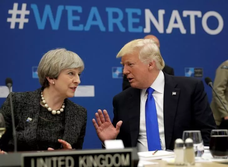 us president donald trump r speaks to britain 039 s prime minister theresa may during in a working dinner meeting at the nato headquarters during a nato summit of heads of state and government in brussels belgium photo reuters us president donald trump r speaks to britain 039 s prime minister theresa may during in a working dinner meeting at the nato headquarters during a nato summit of heads of state and government in brussels belgium photo reuters