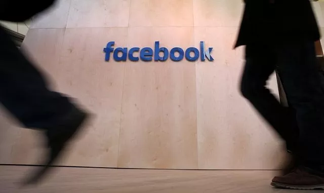 people walk in front of the facebook logo at the new facebook innovation hub during a preview media tour in berlin germany february 24 2016 photo reuters people walk in front of the facebook logo at the new facebook innovation hub during a preview media tour in berlin germany february 24 2016 photo reuters