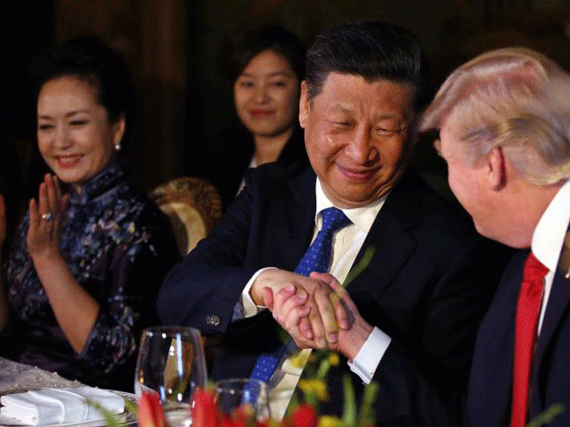 chinese president xi jinping shakes hands with president donald trump as he is accompanied by china 039 s first lady peng liyuan during a dinner at the start of a summit between president trump and president xi at trump 039 s mar a lago estate in west palm beach florida photo reuters chinese president xi jinping shakes hands with president donald trump as he is accompanied by china 039 s first lady peng liyuan during a dinner at the start of a summit between president trump and president xi at trump 039 s mar a lago estate in west palm beach florida photo reuters