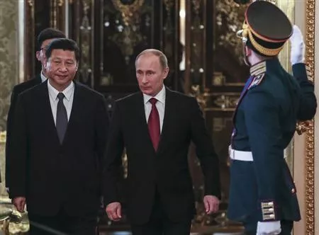 russia 039 s president vladimir putin c and his chinese counterpart xi jinping walk into a hall as they meet at the kremlin in moscow photo reuters russia 039 s president vladimir putin c and his chinese counterpart xi jinping walk into a hall as they meet at the kremlin in moscow photo reuters