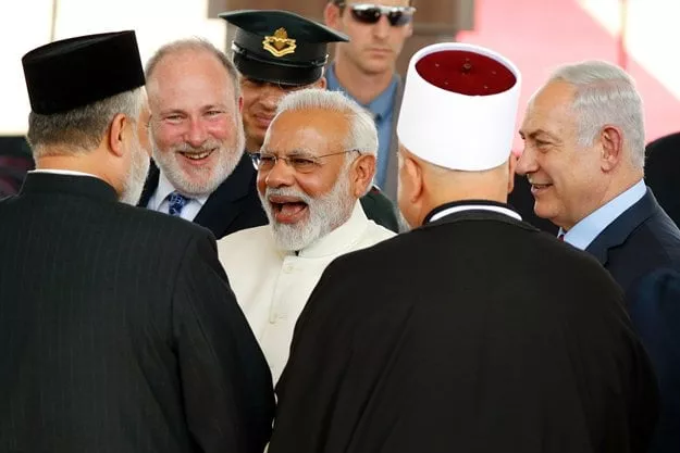 israeli prime minister benjamin netanyahu r introduces his indian counterpart narendra modi c to religious officials during an official ceremony at the ben gurion international airport near tel aviv on july 4 2017 photo afp israeli prime minister benjamin netanyahu r introduces his indian counterpart narendra modi c to religious officials during an official ceremony at the ben gurion international airport near tel aviv on july 4 2017 photo afp