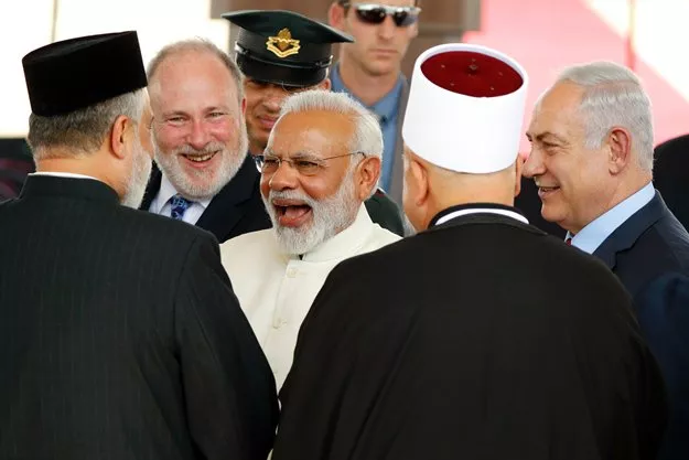 israeli prime minister benjamin netanyahu r introduces his indian counterpart narendra modi c to religious officials during an official ceremony at the ben gurion international airport near tel aviv on july 4 2017 photo afp israeli prime minister benjamin netanyahu r introduces his indian counterpart narendra modi c to religious officials during an official ceremony at the ben gurion international airport near tel aviv on july 4 2017 photo afp