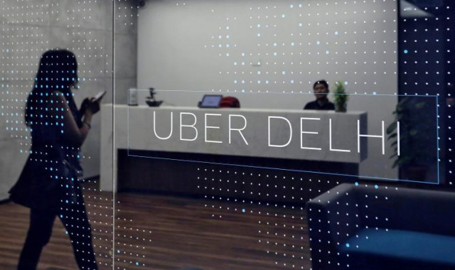 an employee walks inside the office of ride hailing service uber in gurugram previously known as gurgaon on the outskirts of new delhi india april 19 2016 photo reuters an employee walks inside the office of ride hailing service uber in gurugram previously known as gurgaon on the outskirts of new delhi india april 19 2016 photo reuters