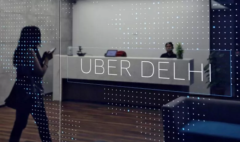 an employee walks inside the office of ride hailing service uber in gurugram previously known as gurgaon on the outskirts of new delhi india april 19 2016 photo reuters an employee walks inside the office of ride hailing service uber in gurugram previously known as gurgaon on the outskirts of new delhi india april 19 2016 photo reuters