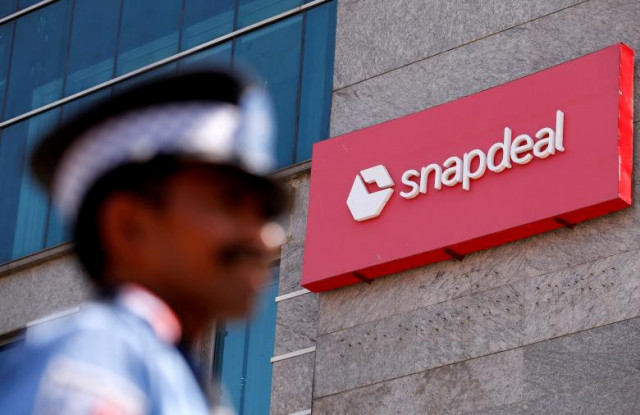 a private security guard stands at a gate of snapdeal headquarters in gurugram on the outskirts of new delhi india april 3 2017 photo reuters a private security guard stands at a gate of snapdeal headquarters in gurugram on the outskirts of new delhi india april 3 2017 photo reuters