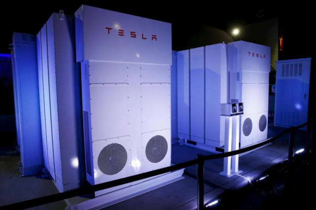 tesla energy batteries for businesses and utility companies are pictured providing energy for the tesla motors powerwall home battery event in hawthorne california photo reuters
