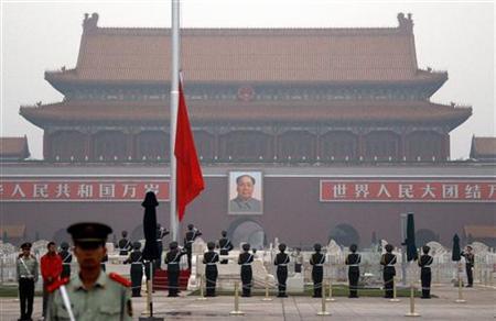 paramilitary policemen stand guard as the chinese national flag is raised on beijing 039 s tiananmen square on june 4 2012 marking the 23rd anniversary of the military crackdown on the square of a student pro democracy movement photo reuters